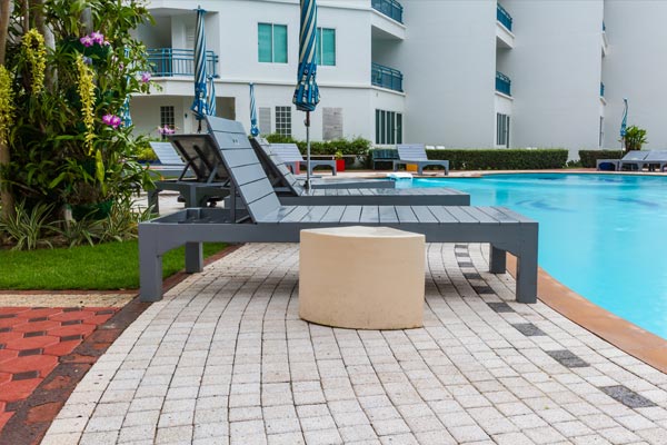 The image shows a swimming pool in a hotel.